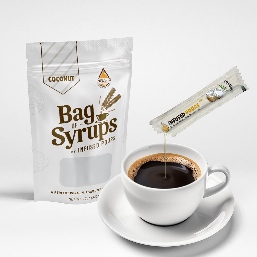 Bag of coconut syrup packets pouring into a coffee cup
