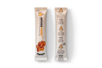 Close-up of an individual caramel syrup packet
